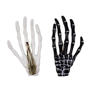Gothic skull hand bone hair clips in black and white colors for Halloween costumes