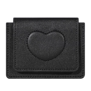 Minimalist black pebble leather small wallet for women with heart embossed detail