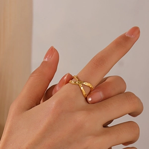 Minimalist gold criss-cross X-shaped stainless steel ring with vintage hammered texture finish