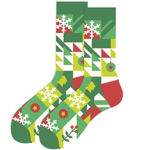 Detail of Christmas crew socks with green and red geometric holiday patterns