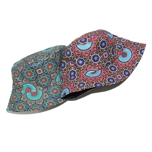 Detail of bohemian bucket hats with intricate geometric mandala prints in two colors