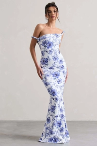 Close-up of elegant blue floral print on slim fit off-shoulder evening maxi dress