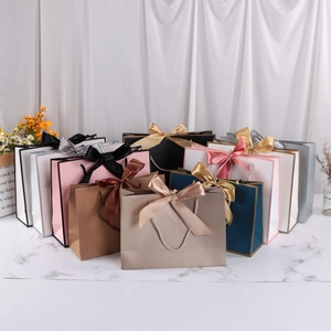 Elegant Paper Gift Bags With Large Ribbon Bow Decor Thick Cardboard Handbags For Wedding Party Favors Boutique Shopping