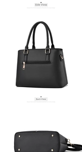 Detail view of black handbag showing smooth texture, back zipper, and gold protective feet