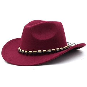 Detail of burgundy wool fedora hat featuring a wooden beaded chain and wide brim