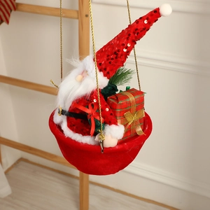 Hanging Santa Claus in red velvet hot air balloon basket with festive gift box decor