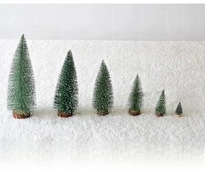 Size chart showing six mini flocked Christmas trees with snow effect from 5cm to 30cm