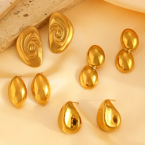 Polished gold geometric earrings set with teardrop and irregular spiral designs