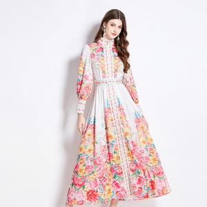Floral maxi dress with mandarin collar and long sleeves featuring a matching waist belt
