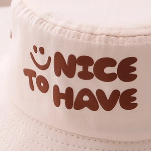 Chapeau de pêcheur rose pour enfants avec lettres NICE TO HAVE et motif de sourire