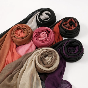 Gradient color pleated scarves in various tones arranged in a decorative flower layout