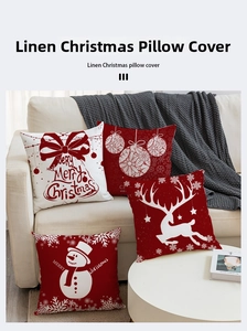 Detailed view of four linen Christmas pillow covers with reindeer and snowman prints