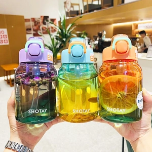 Three gradient Tritan water bottles held by hand, showing BPA-free materials and straw lids