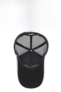 Detail view of breathable mesh lining and internal sweatband on black baseball cap