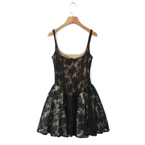 Close-up of black lace sleeveless dress featuring intricate floral hollow-out textures