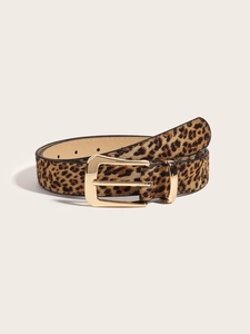 Detailed view of women's leopard print belt with a polished gold square buckle