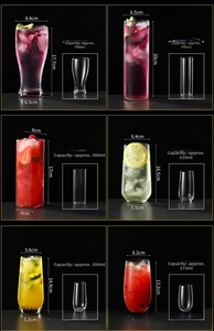 Close-up of various creative glassware sizes and shapes with colorful refreshing drinks
