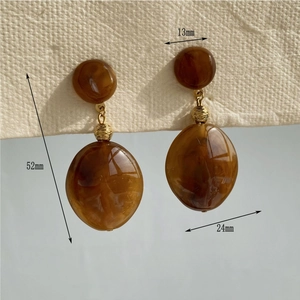 Brown marble resin drop earrings with gold metal links and 52mm length dimensions