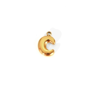 Macro detail of puffy 3D golden letter C charm with polished mirror finish surface