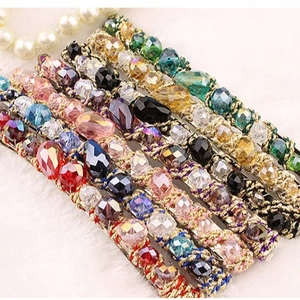 Handcrafted headband with braided gold thread and colorful faceted crystal beads