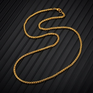 Detail of a high-polish golden wheat chain necklace with a secure lobster claw clasp
