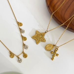 Three-layer gold titanium steel necklace with star, cross and clover pendants for women