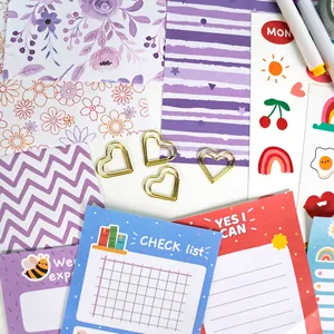 Purple DIY journal stationery gift set with colorful stickers and metal clips
