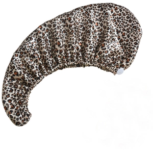 Detail of leopard print satin hair wrap showing the smooth texture and secure button fastener