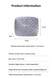Size guide for blue quilted cosmetics bag with pink bow detail and cotton lining