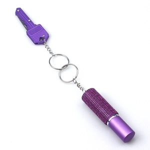 Fashionable purple rhinestone perfume bottle and folding knife keychain set for bags