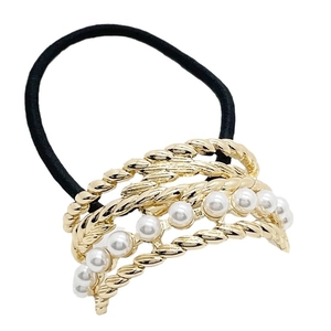 Minimalist U-shaped alloy hair tie with gold metallic texture and pearl accents