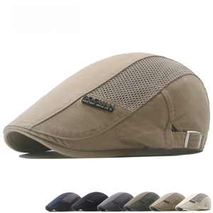 Detail of khaki cotton mesh beret hat with adjustable metal buckle and breathable side panels