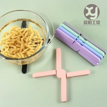 Foldable cross heat insulation pad in multiple colors for kitchen table protection
