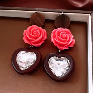 Vintage style wood bead earrings with pink resin roses and red zircon heart pendants