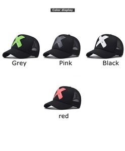 Detailed color display of mesh trucker hats with 3D printed X logo in multiple vibrant colors