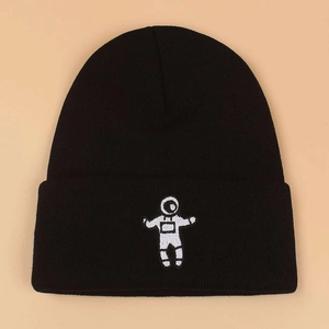Winter casual black knit beanie featuring a white astronaut embroidery on the front