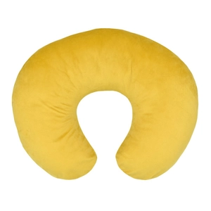 Macro view of plush golden U-shaped nursing pillow cover with soft fabric texture