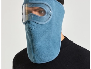 Detail of blue fleece winter mask with integrated goggles and breathable vents for wind protection