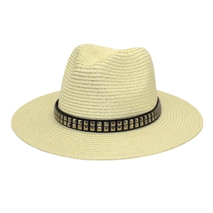 Detailed macro view of the straw fedora with black leather band and metal rivets