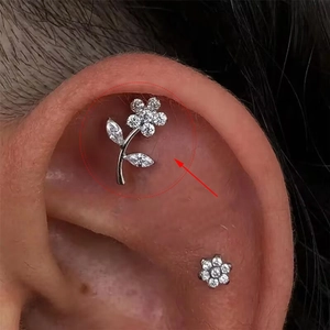F136 titanium piercing stud with zircon rose flower design worn on the ear helix