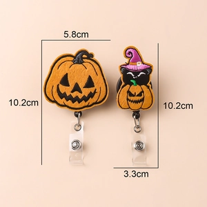 Detail of Halloween retractable badge reels with pumpkin and wizard cat embroidery