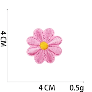 Detailed view of pink floral embroidery patch with dimensions of 4cm by 4cm and 0.5g weight