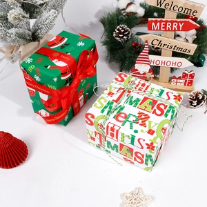 Christmas gift box set with Santa patterns and Merry Christmas text in festive setting