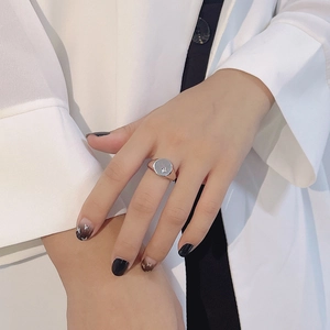 S925 sterling silver geometric signet ring with engraved star pattern on a model hand