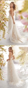 Detail of elegant V-neck sleeveless lace wedding dress with intricate floral embroidery