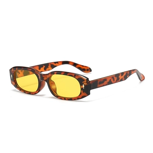 Retro oval sunglasses with leopard print frame and yellow tinted lenses for fashion