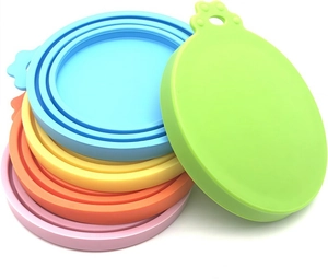 Detailed view of silicone pet food can lids with tiered sealing rings and cat paw handle
