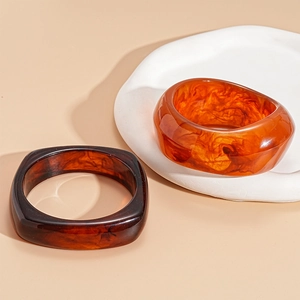 Maillard style amber resin irregular geometric bangles with retro vintage marble texture
