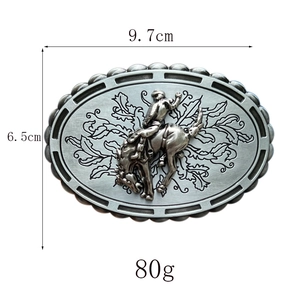 Detail view of equestrian belt buckle measuring 9.7cm x 6.5cm in vintage silver finish