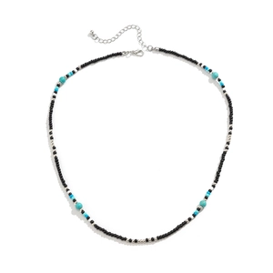 Bohemian beaded necklace for men with turquoise and black beads on white background
